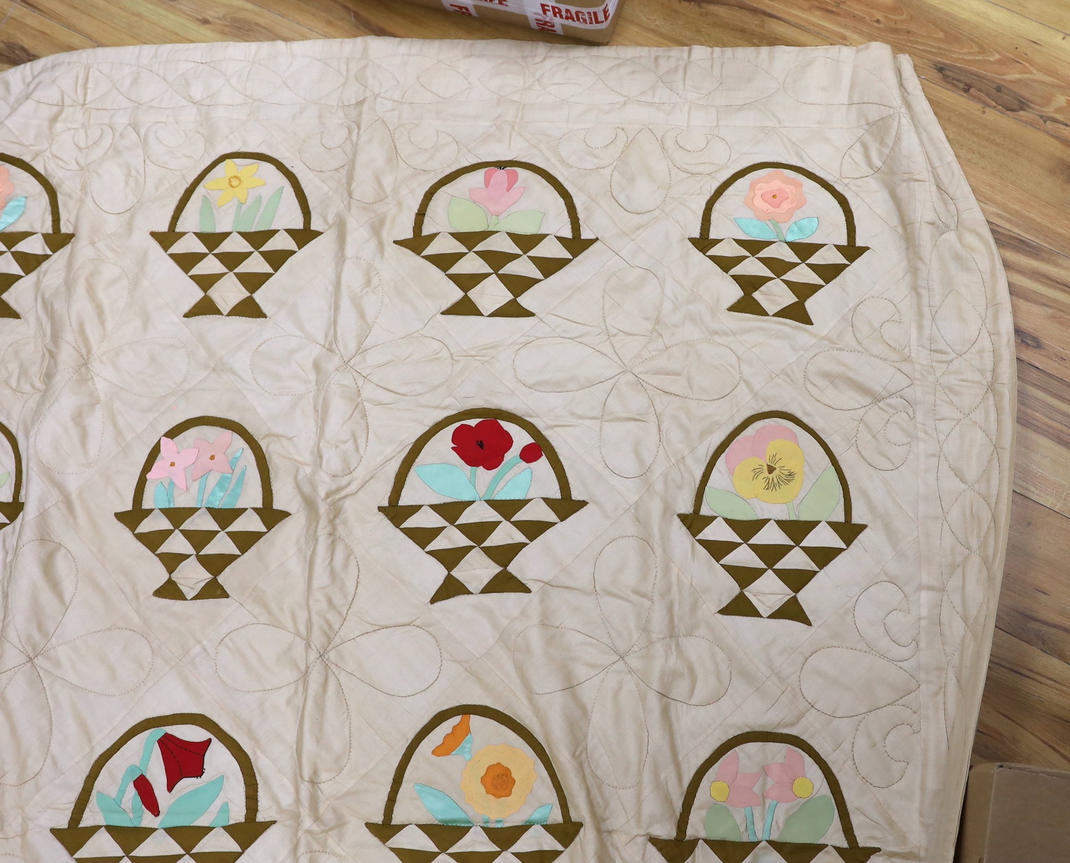 A North American embroidered silk quilt